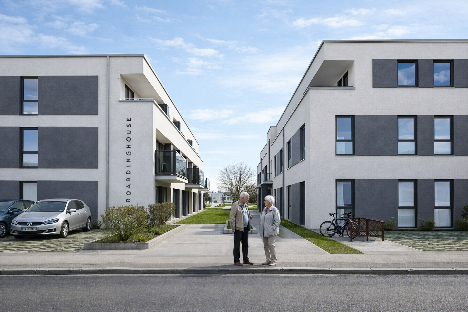 Boardinghouse Kronau bei Tag – Innenhof zwischen den Gebäuden